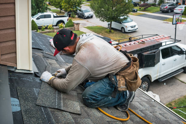 Professional Roofing technician working in Dent, OH